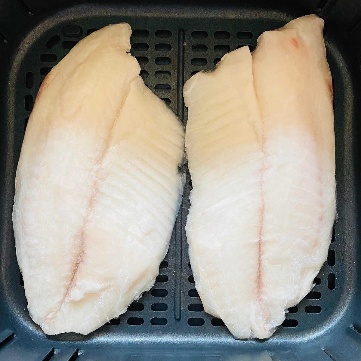 frozen tilapia in air fryer basket