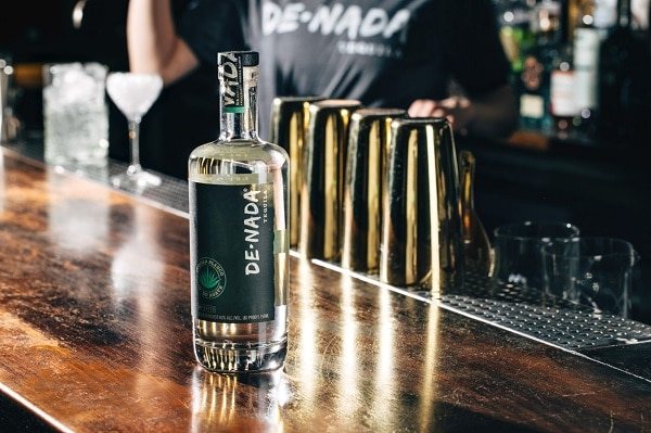 de-nada tequila bottle on bar