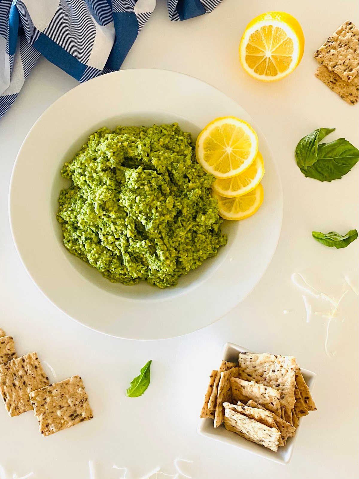 cashew pesto recipe with lemons and crackers