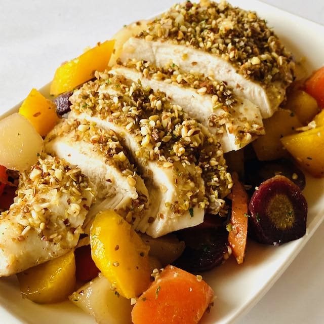 Dukkah-Spice-Chicken-on-plate-sliced-into-thin-strips