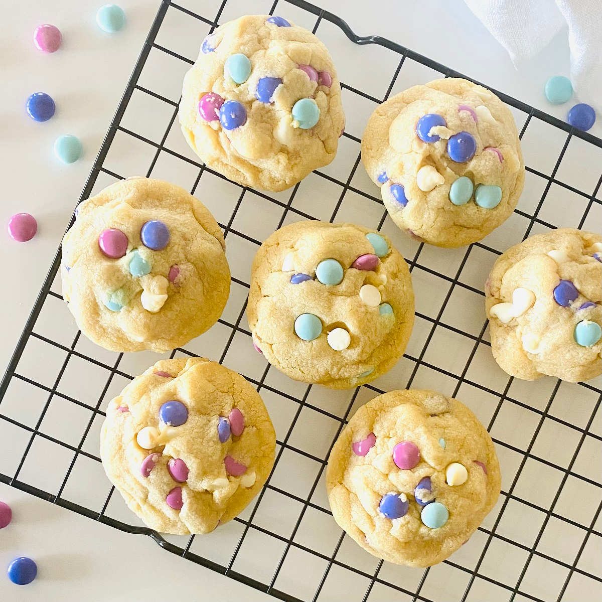 m&m easter cookies on a cooling rack