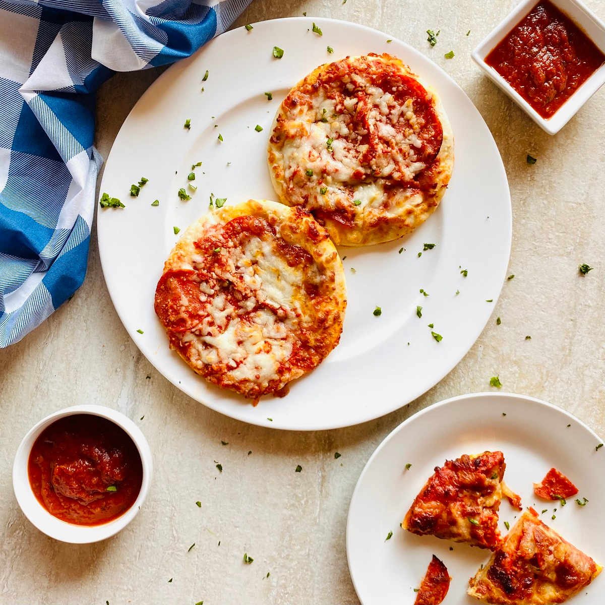 air fryer frozen pizza on plate with marinara sauce