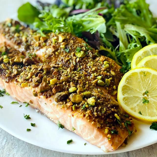 cooked salmon with pistachio crust.