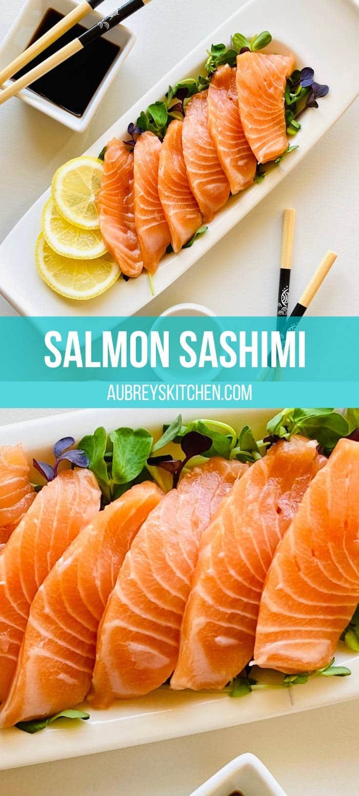 salmon sashimi on a bed of microgreens garnished with lemon next to soy sauce and chopsticks