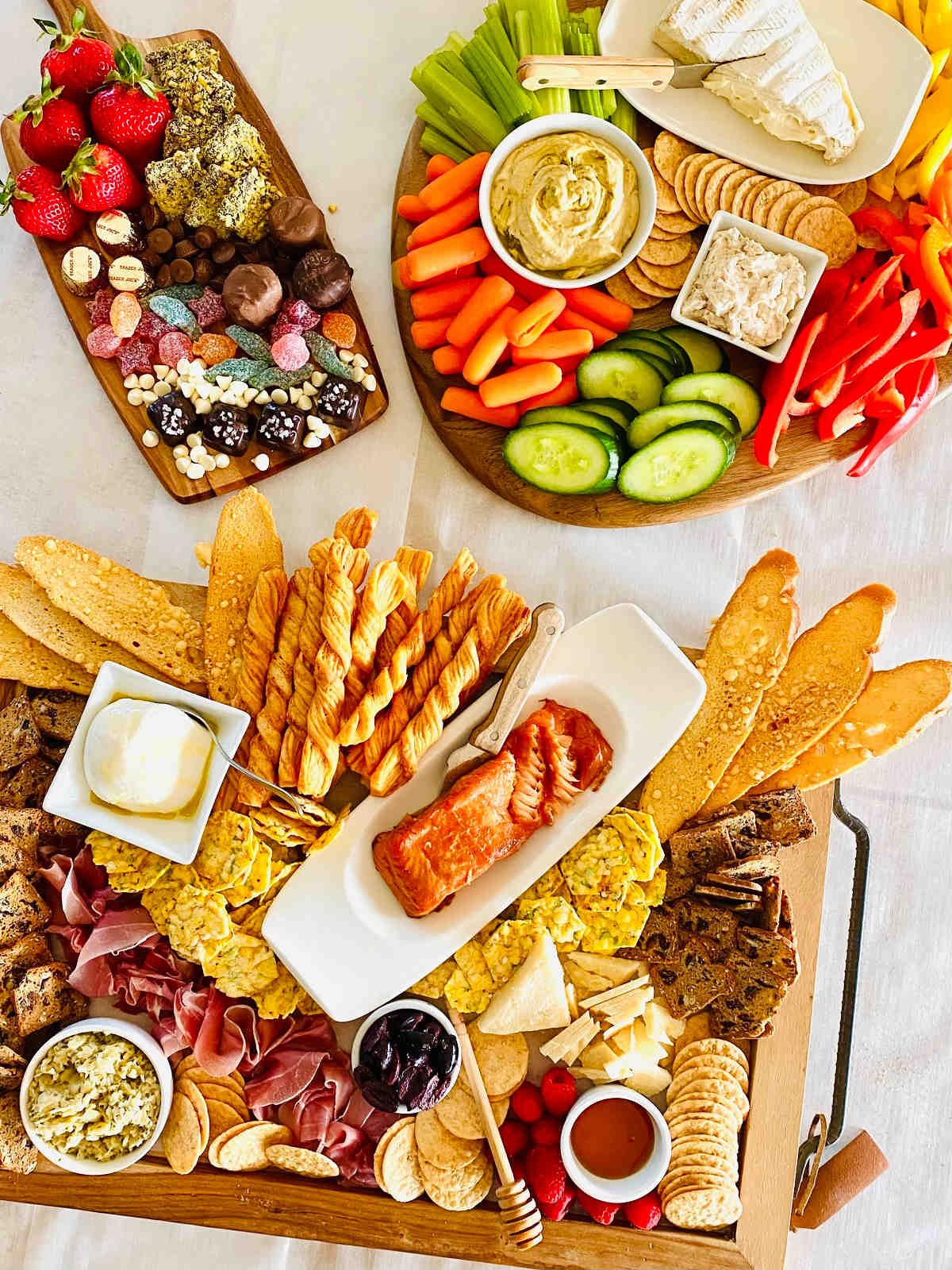 Vegetarian charcuterie board, desert charcuterie board and trader joe's cheese and meat board