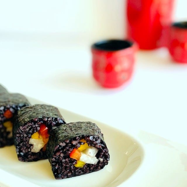 black-rice-sushi--red-sake-glass