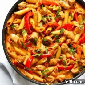 One pan full of pasta, sausage and pepper for the perfect creamy pasta dish.