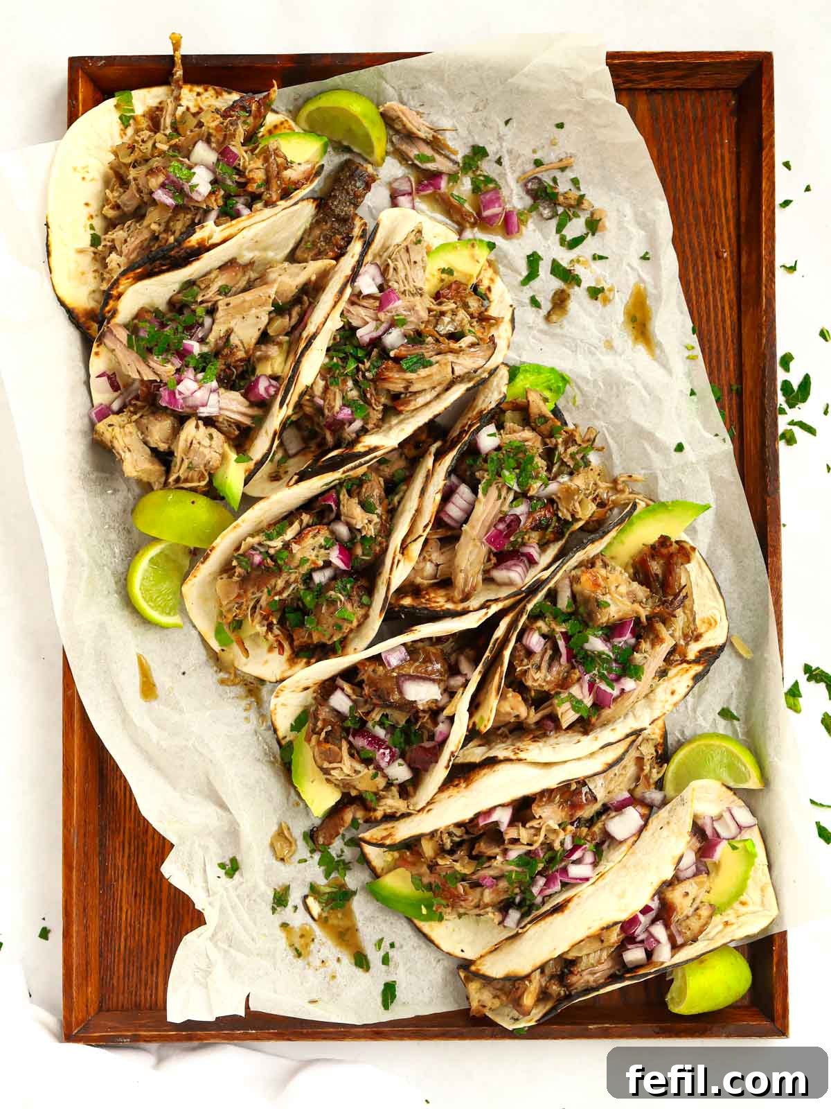 Slow Cooker Pork Carnitas, a delicious crowd-pleasing dish with juicy, crispy pork