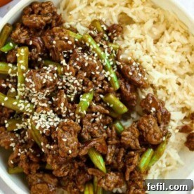 Sticky Mince Beef Stir Fry with green beans in a bowl with rice.