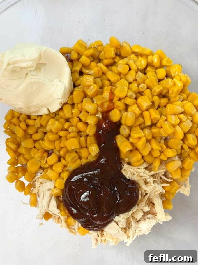 Step 2 in the recipe for Chicken Wraps. Mix the ingredients together in a bowl.