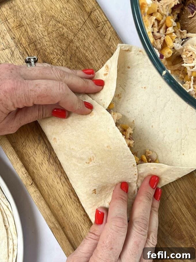 Step 4 in the recipe for Chicken Wraps.