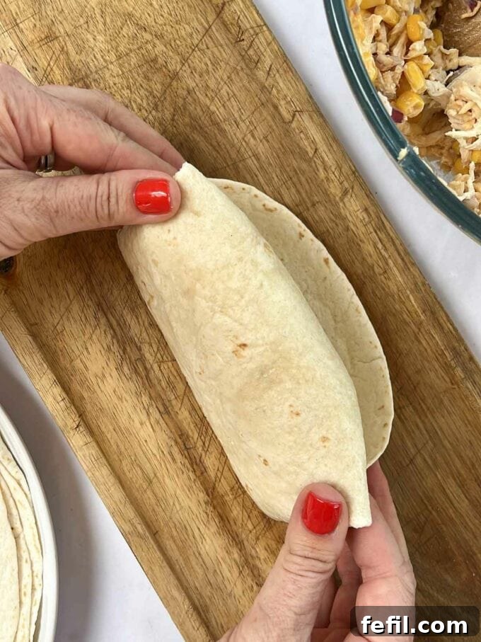 Step 5 in the recipe for Chicken Wraps.