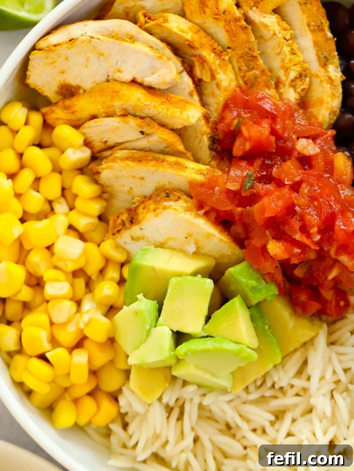 A super quick recipe for No Cook Burrito Bowls, beautifully arranged and ready to eat.
