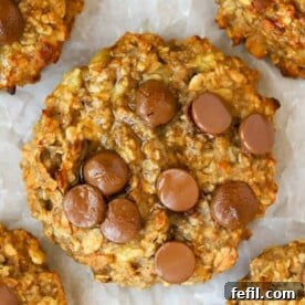 Delicious and healthy banana breakfast cookies with peanut butter and chocolate chips, freshly baked and ready for meal prep.