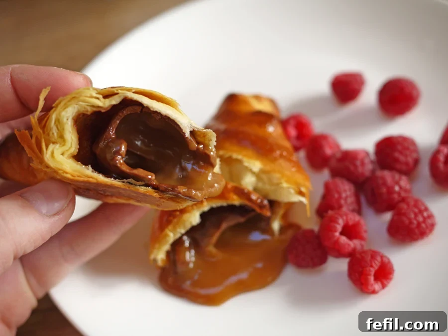 Cadbury Caramel Egg Croissants served with fresh raspberries for a balanced breakfast.